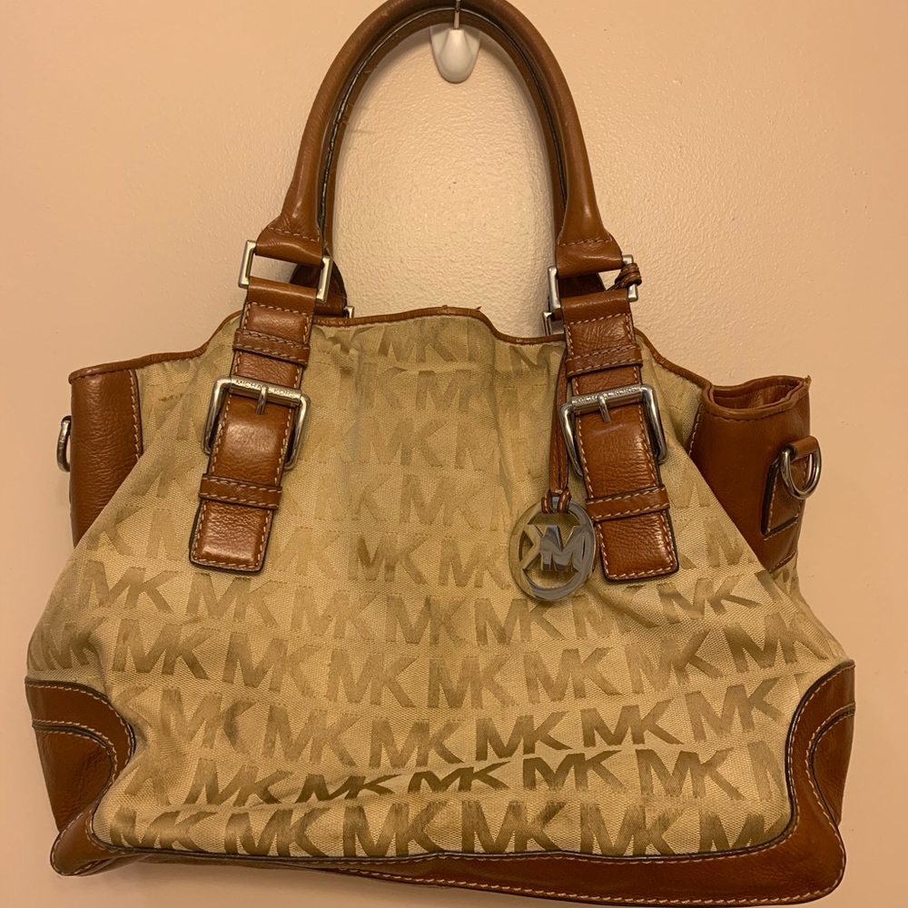 Michael Kors brown signature bag.